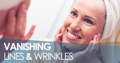 Woman happily showing off her smooth, wrinkle-free skin after facial treatments